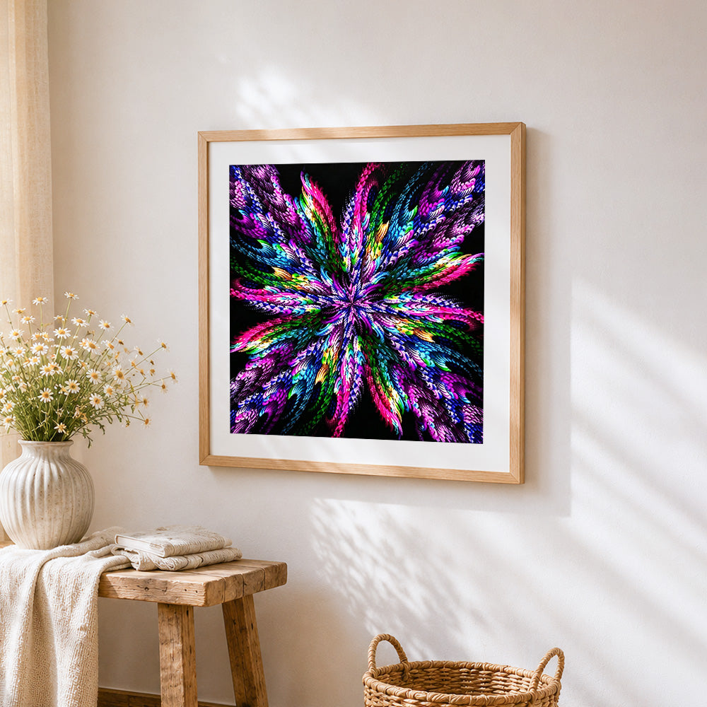 Colourful feather burst mandala cross stitch artwork displayed on wall as home decor