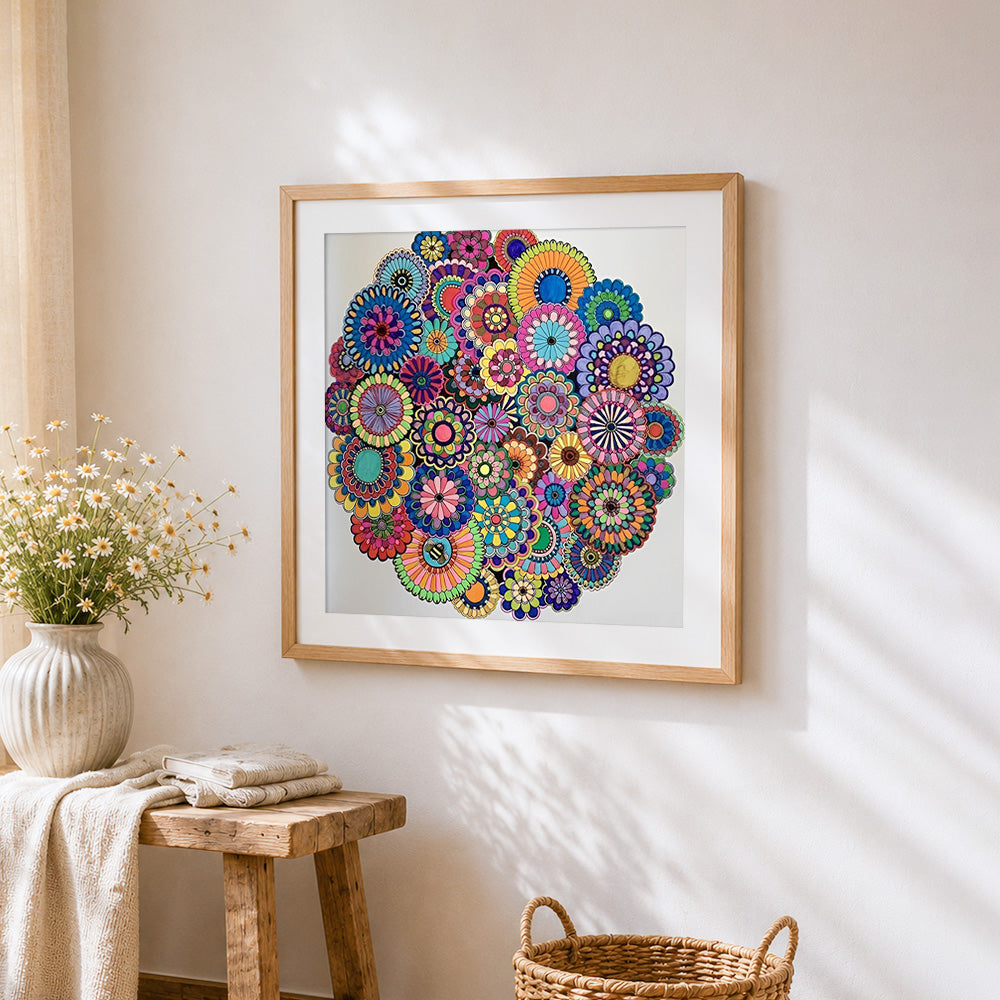 Colourful floral mandala collage cross stitch artwork displayed on wall as home decor