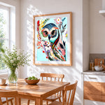 Colourful floral owl cross stitch artwork displayed on wall as home decor