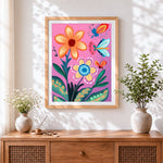 Finished colourful floral pattern with butterflies cross stitch artwork displayed