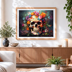 Finished colourful floral skull cross stitch artwork displayed