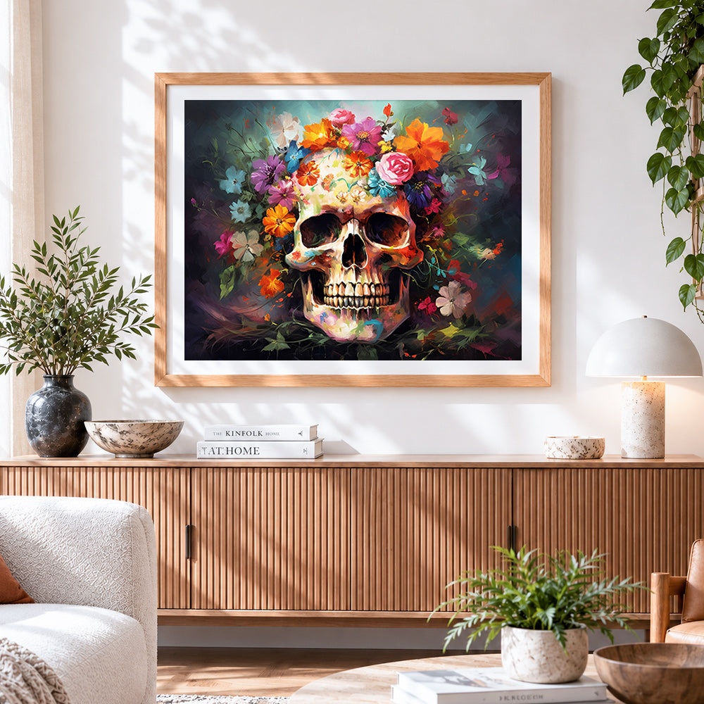 Finished colourful floral skull cross stitch artwork displayed