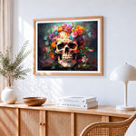 Colourful floral skull cross stitch artwork displayed on wall as home decor