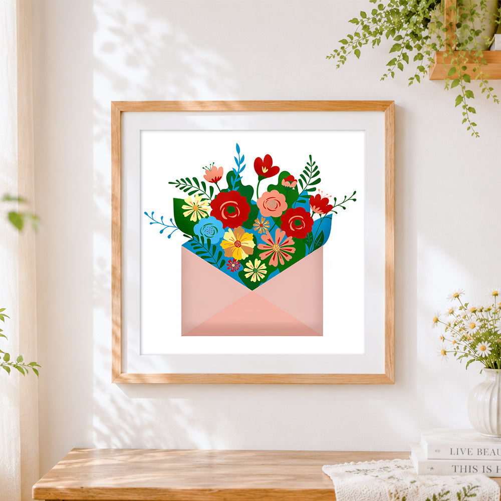 Finished colourful flowers in an envelope cross stitch artwork displayed