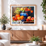 Finished colourful fruit and blue jug cross stitch artwork displayed