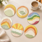 Colourful geometric landscape punch needle coasters used for home decoration