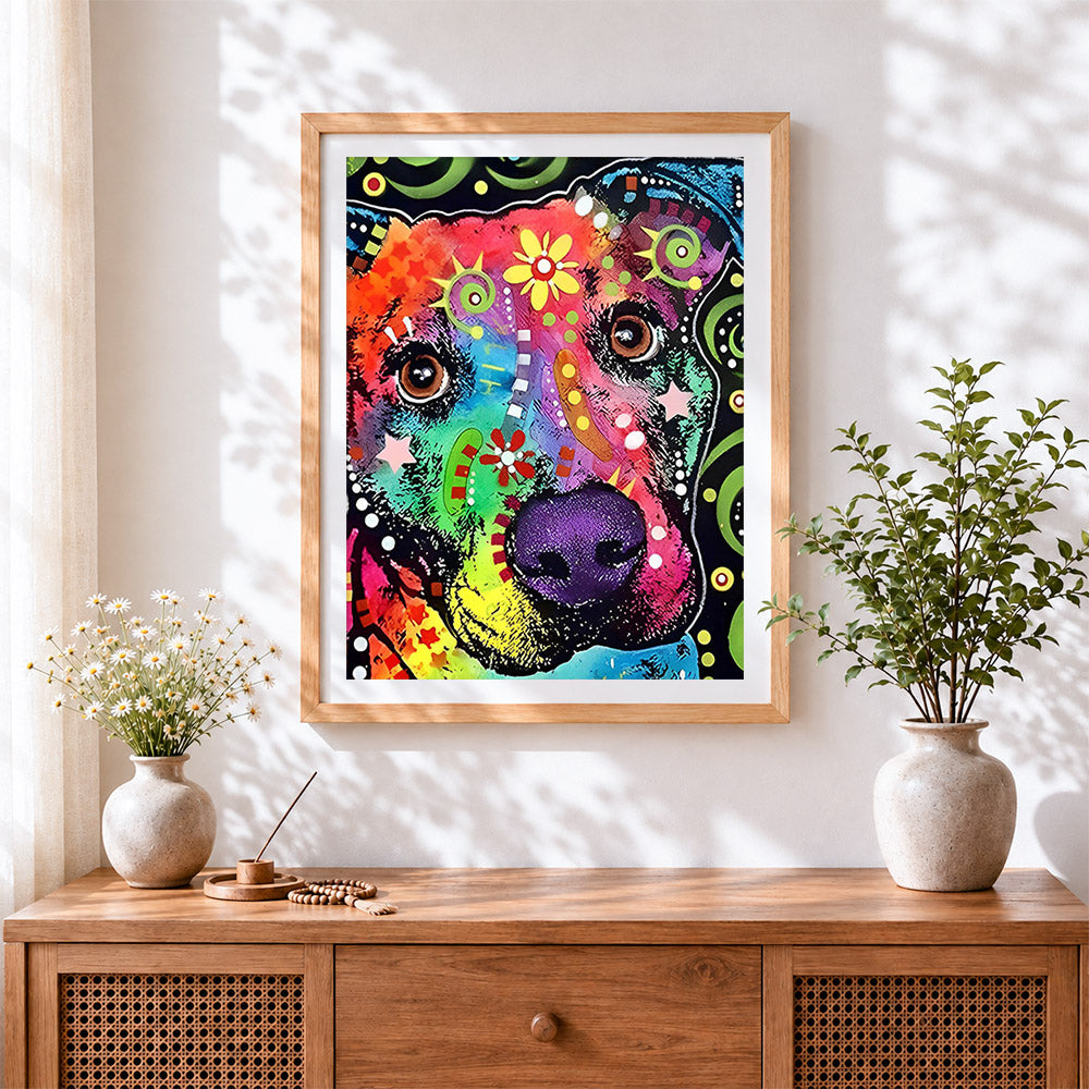 Finished colourful graffiti dog cross stitch artwork displayed