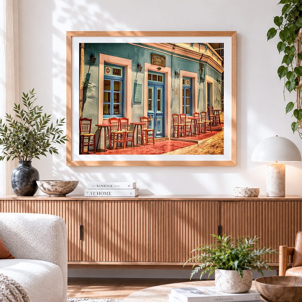 Finished colourful greek taverna cross stitch artwork displayed