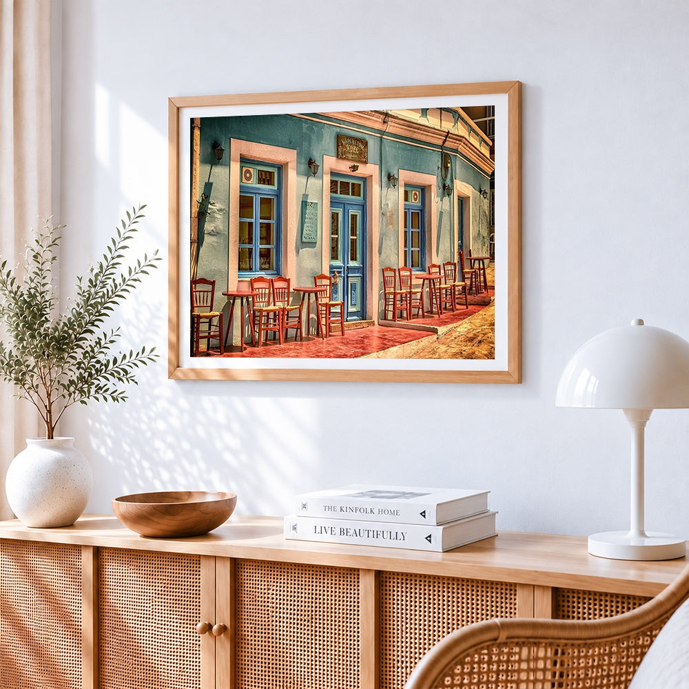 Colourful greek taverna cross stitch artwork displayed on wall as home decor