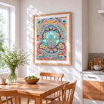 Colourful hamsa hand mandala cross stitch artwork displayed on wall as home decor