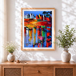 Finished colourful harbour cross stitch artwork displayed