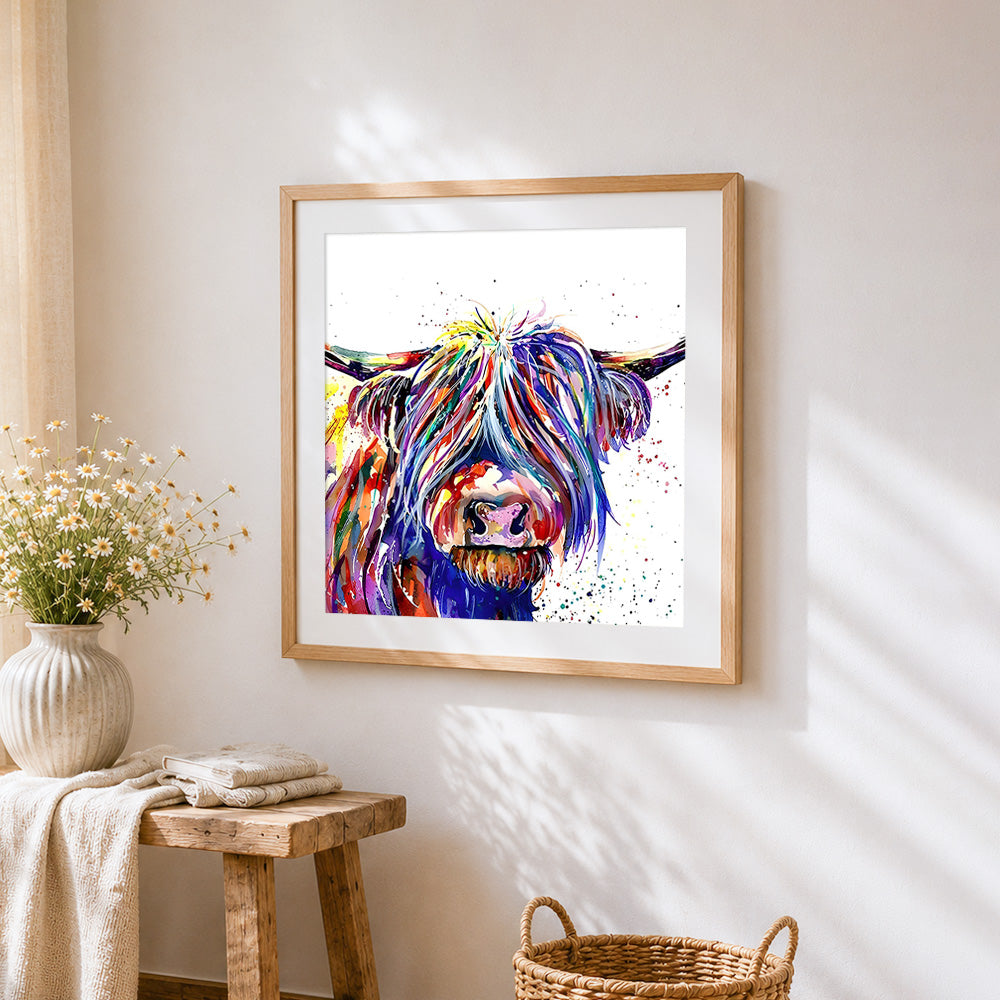 Colourful highland cow splatter art paint by numbers artwork displayed on wall as home decor