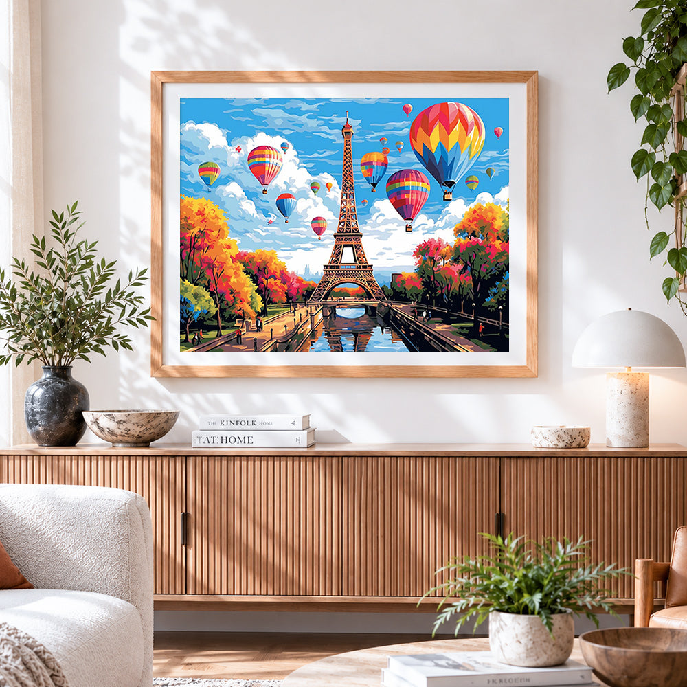 Finished colourful hot air balloons over eiffel tower paint by numbers artwork displayed as home decor