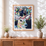 Finished colourful impasto deer cross stitch artwork displayed