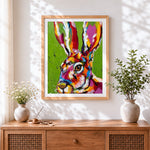 Finished colourful impasto hare cross stitch artwork displayed