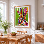 Colourful impasto hare cross stitch artwork displayed on wall as home decor