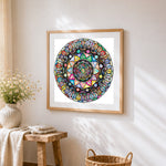 Colourful intricate mandala cross stitch artwork displayed on wall as home decor