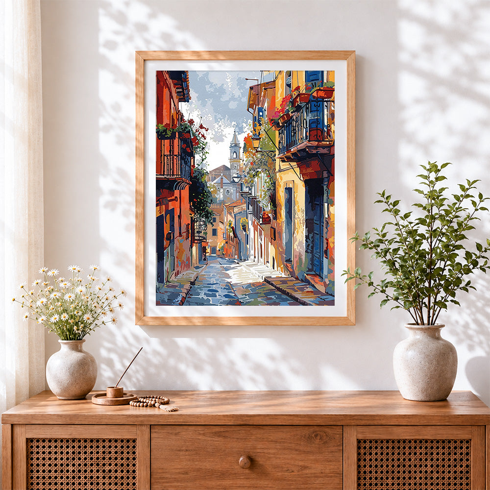 Finished colourful italian street cross stitch artwork displayed