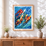 Finished colourful koi fish in blue water cross stitch artwork displayed