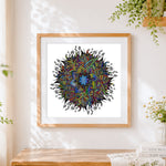 Finished colourful line art mandala cross stitch artwork displayed