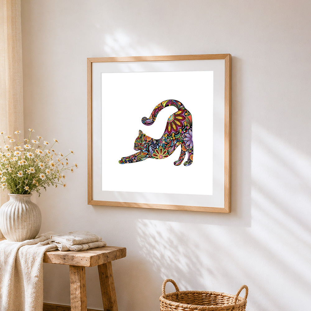 Colourful mandala cat stretching cross stitch artwork displayed on wall as home decor