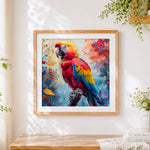 Finished colourful modern pop art macaw cross stitch artwork displayed