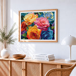 Colourful modern roses cross stitch artwork displayed on wall as home decor