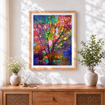 Finished colourful mosaic tree cross stitch artwork displayed