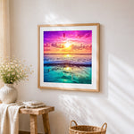 Colourful ocean waves at sunset cross stitch artwork displayed on wall as home decor