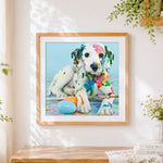 Finished colourful painted dalmatian puppy cross stitch artwork displayed
