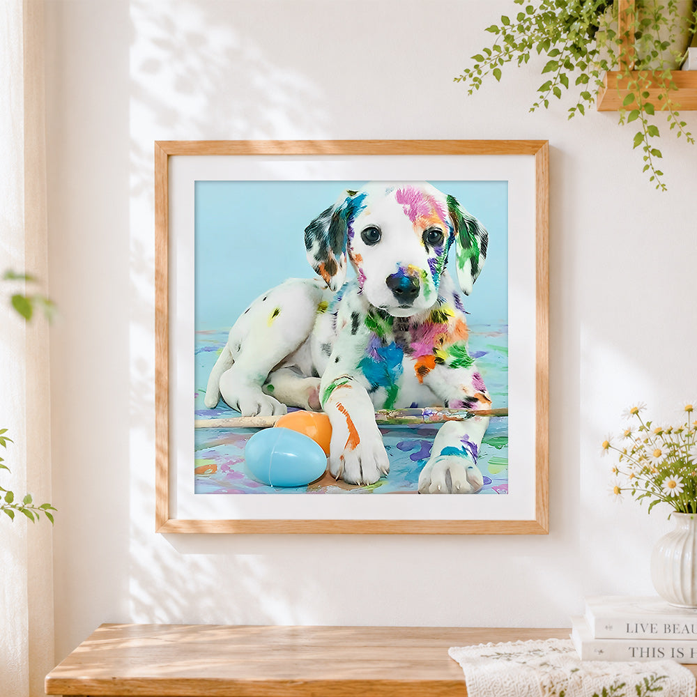 Finished colourful painted dalmatian puppy cross stitch artwork displayed