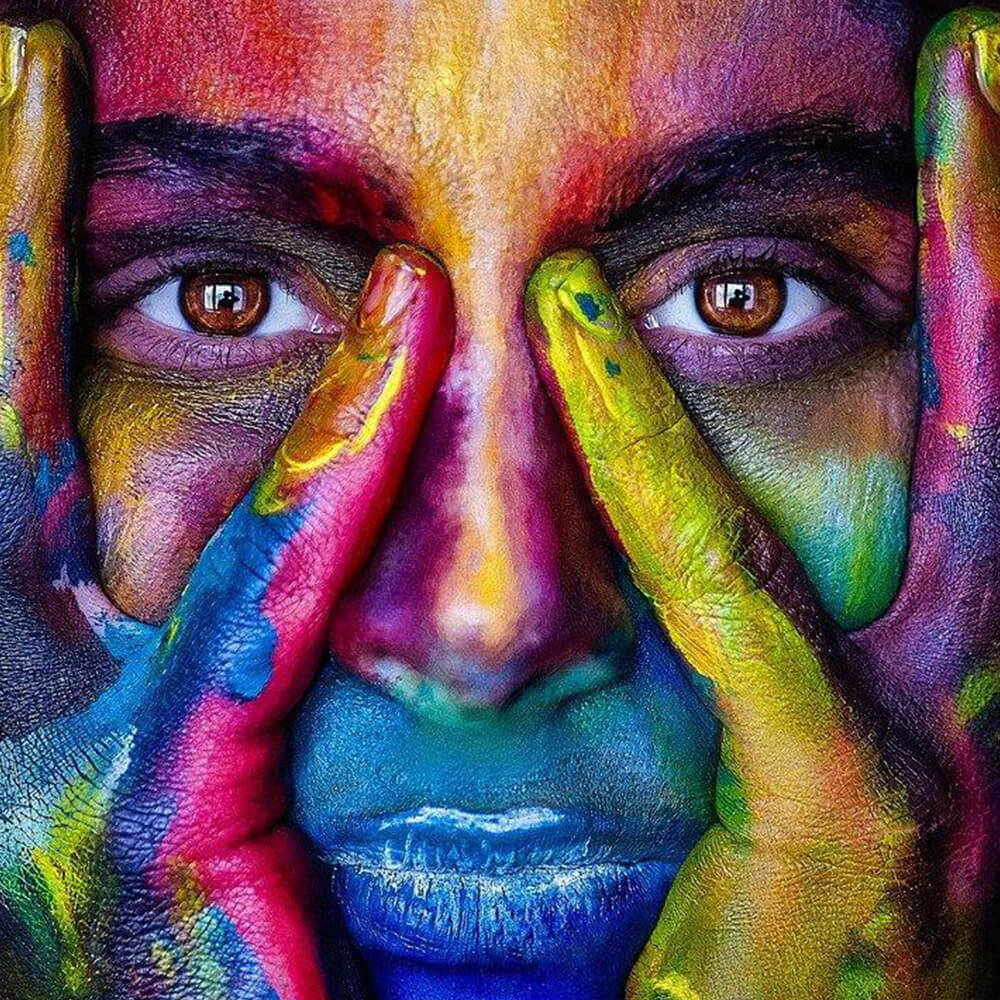 Colourful painted face close-up cross stitch kit for beginners