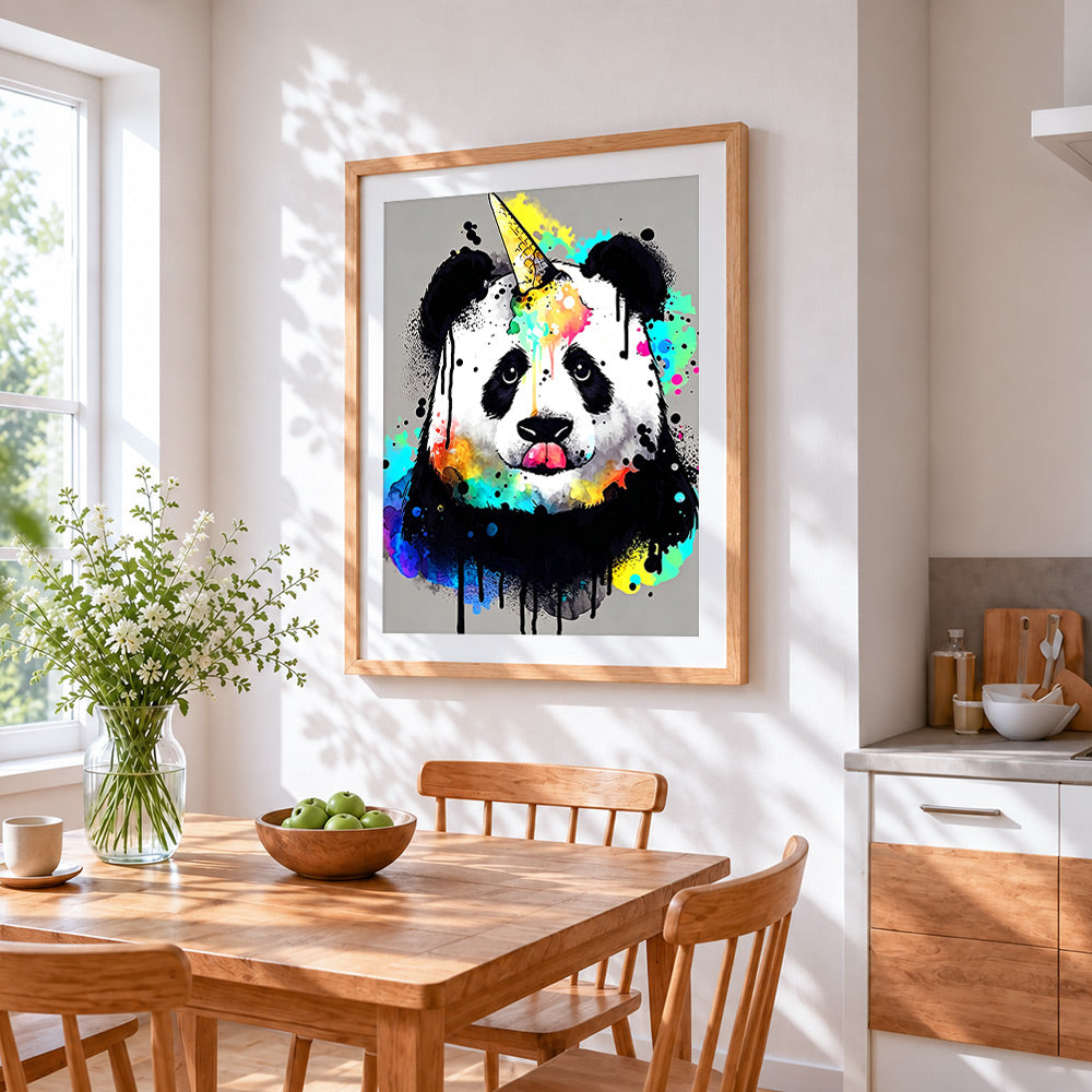 Colourful panda with a unicorn horn cross stitch artwork displayed on wall as home decor