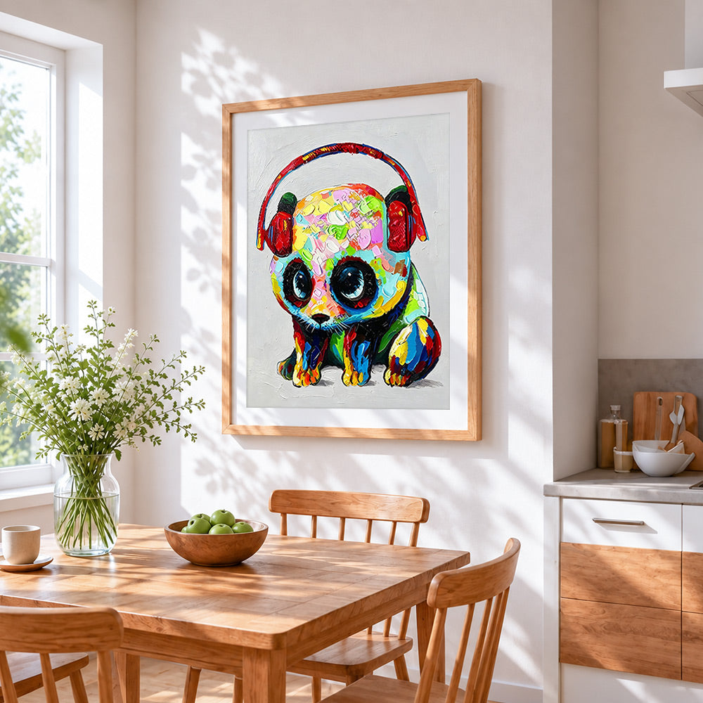 Colourful panda with headphones cross stitch artwork displayed on wall as home decor