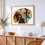 Colourful pop art beagle portrait cross stitch artwork displayed on wall as home decor