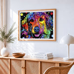 Colourful pop art dog with doodles cross stitch artwork displayed on wall as home decor