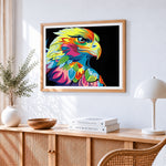 Colourful pop art eagle on black background paint by numbers artwork displayed on wall as home decor