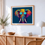 Colourful pop art elephant with sunglasses cross stitch artwork displayed on wall as home decor
