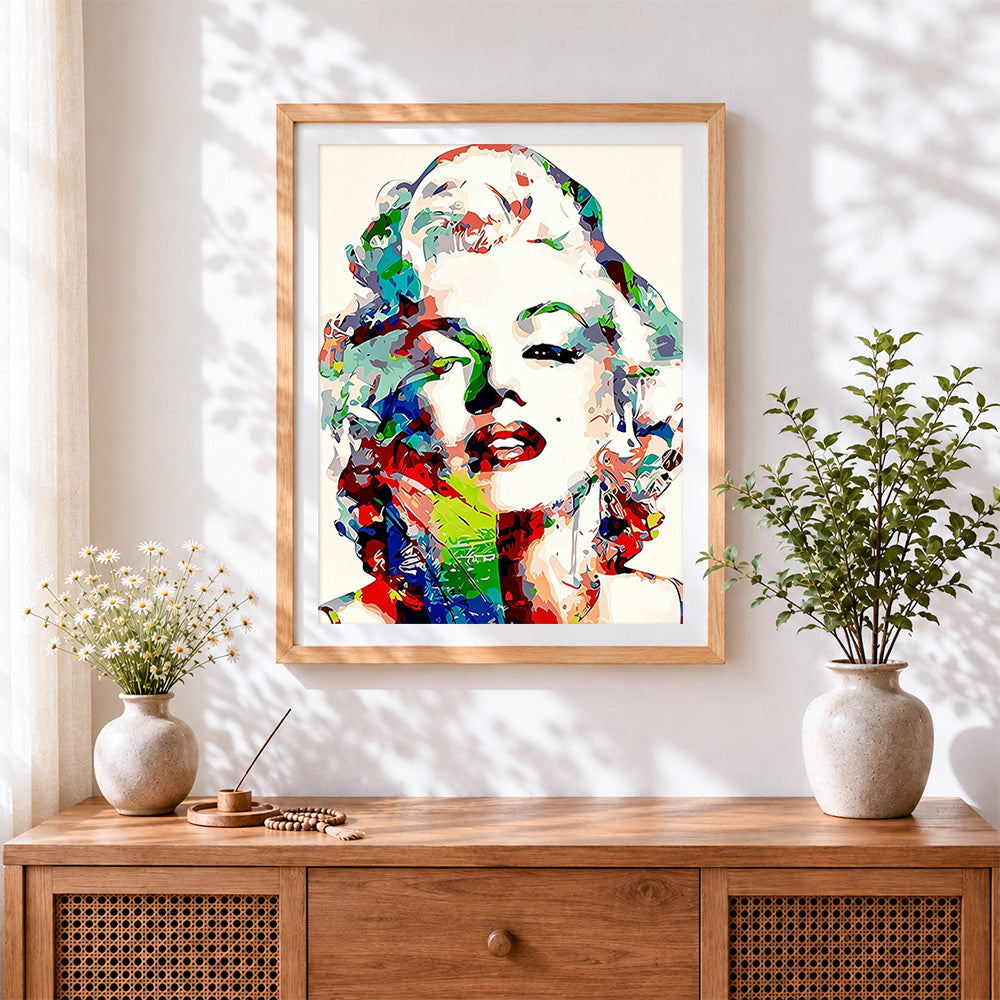 Finished colourful pop art marilyn monroe cross stitch artwork displayed