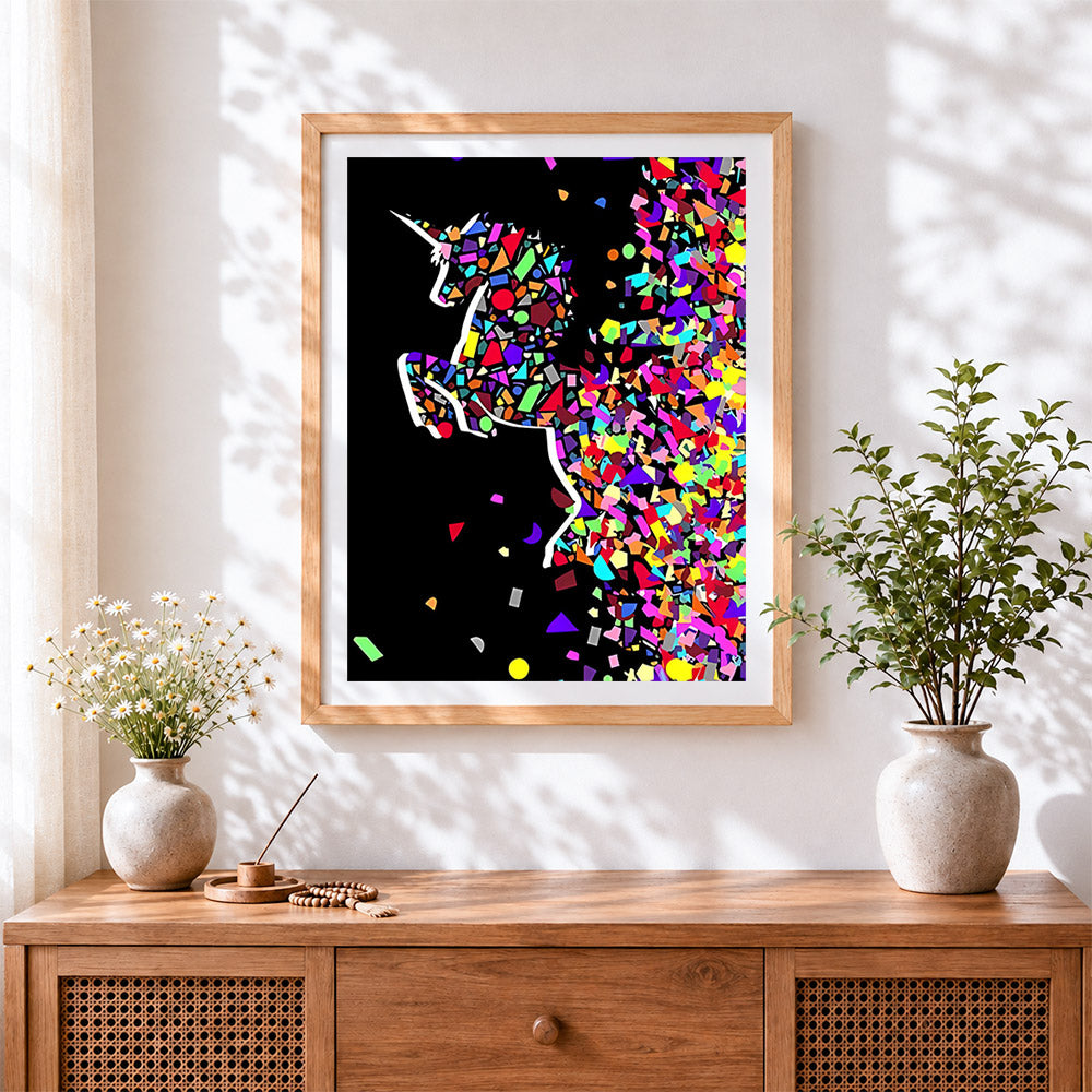 Finished colourful shattered unicorn cross stitch artwork displayed