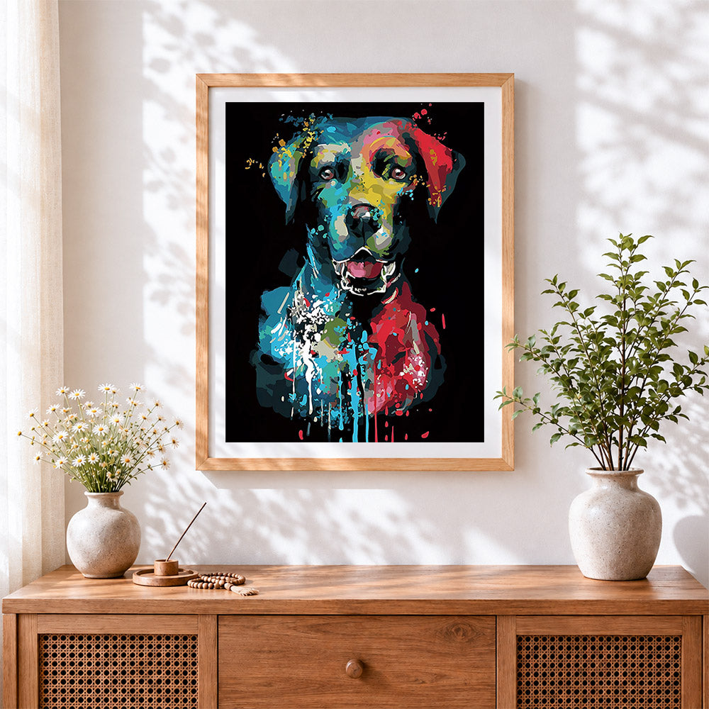 Finished colourful splatter dog in the dark cross stitch artwork displayed