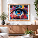 Finished colourful splatter eye on dark print paint by numbers artwork displayed as home decor