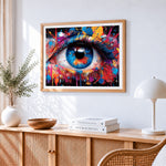 Colourful splatter eye on dark print paint by numbers artwork displayed on wall as home decor