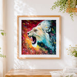Finished colourful splatter roaring lion cross stitch artwork displayed