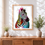 Finished colourful splatter zebra cross stitch artwork displayed
