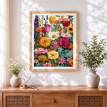 Finished colourful spring flowers cross stitch artwork displayed