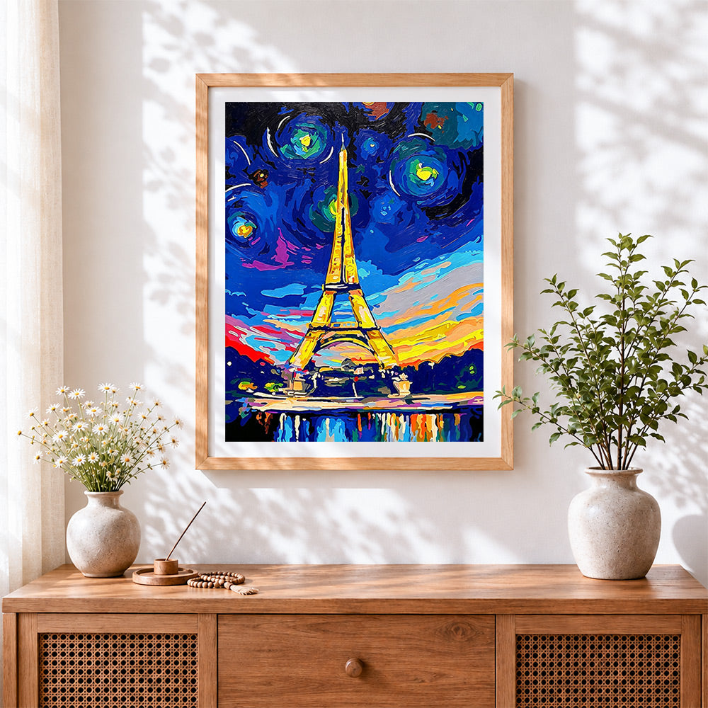 Finished colourful starry night eiffel tower cross stitch artwork displayed