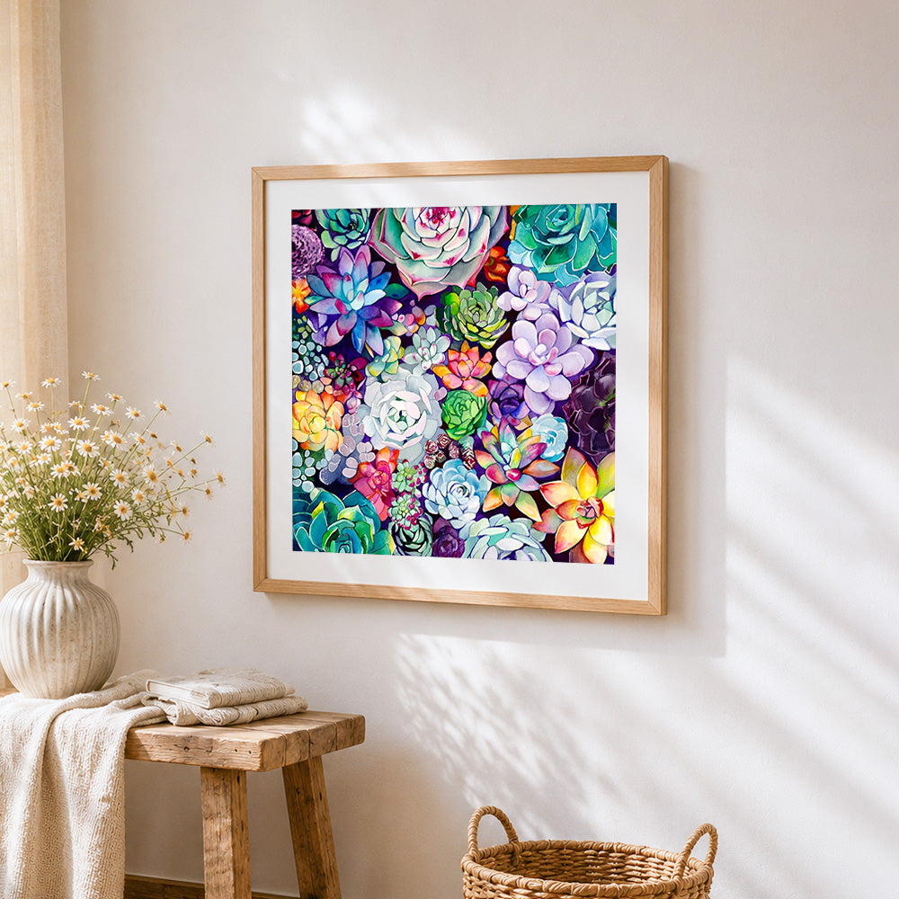 Colourful succulent plants pattern cross stitch artwork displayed on wall as home decor