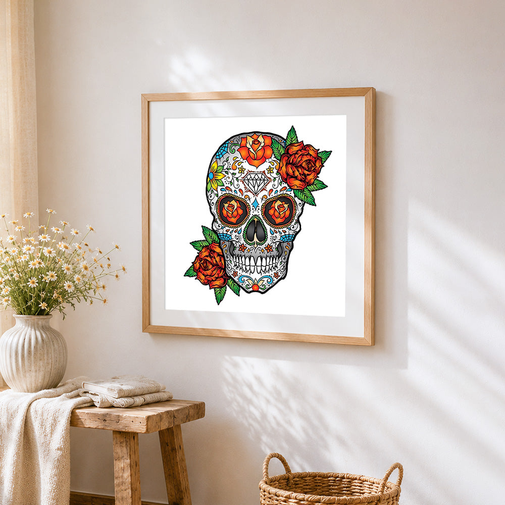 Colourful sugar skull with orange roses cross stitch artwork displayed on wall as home decor