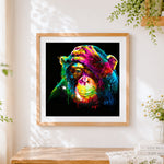 Finished colourful thinking chimpanzee cross stitch artwork displayed